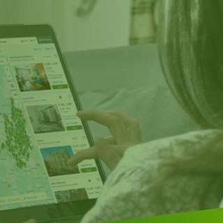 woman browsing apartments.com on tablet